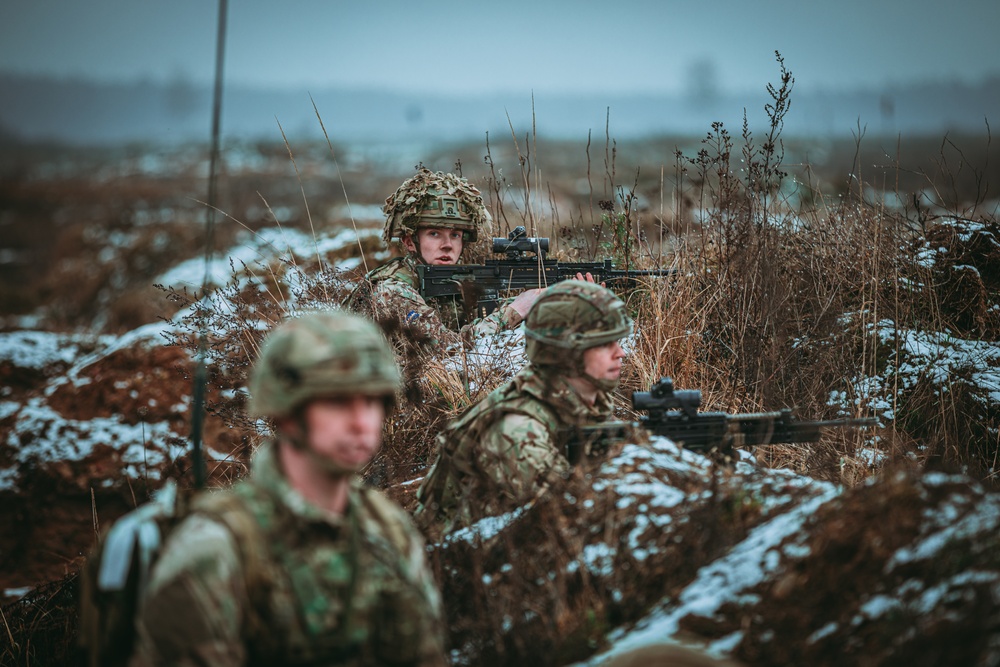 British Soldiers complete section live fire training during eFP