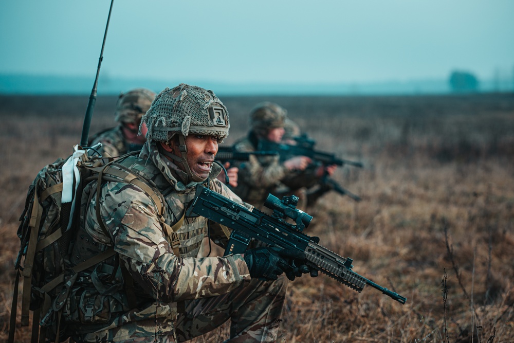 British Soldiers complete section live fire training during eFP