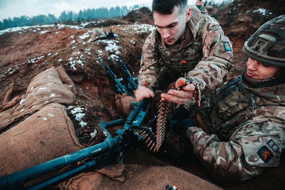 British Soldiers complete section live fire training during eFP