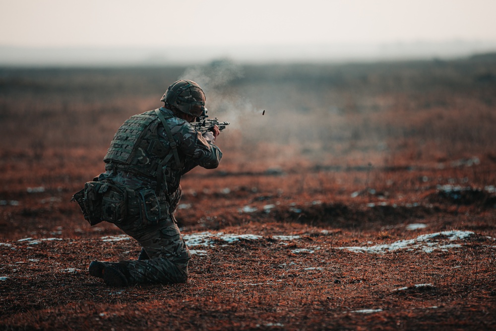 British Soldiers complete section live fire training during eFP