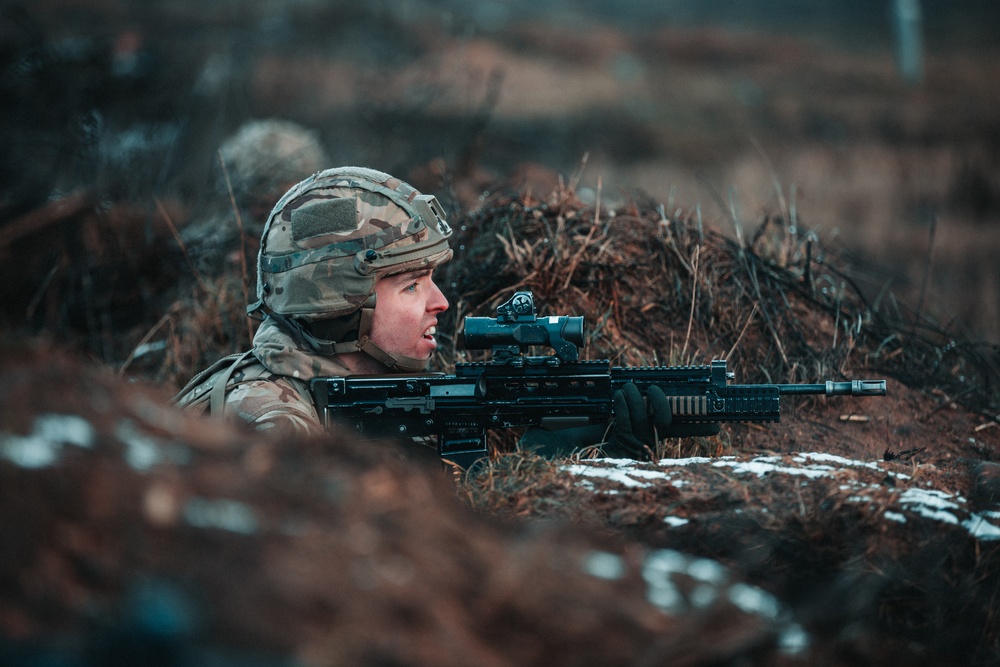 British Soldiers complete section live fire training during eFP