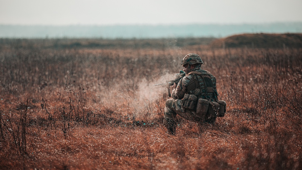 British Soldiers complete section live fire training during eFP