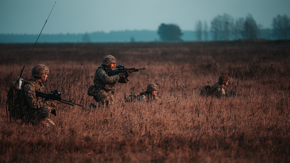 British Soldiers complete section live fire training during eFP