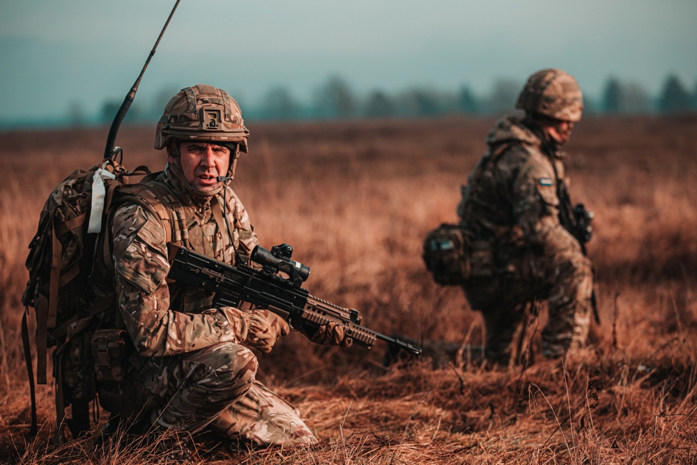 British Soldiers complete section live fire training during eFP