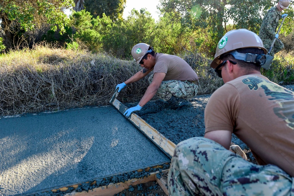 Seabees Place Concrete at Stinger’s Field, Support Ongoing Project