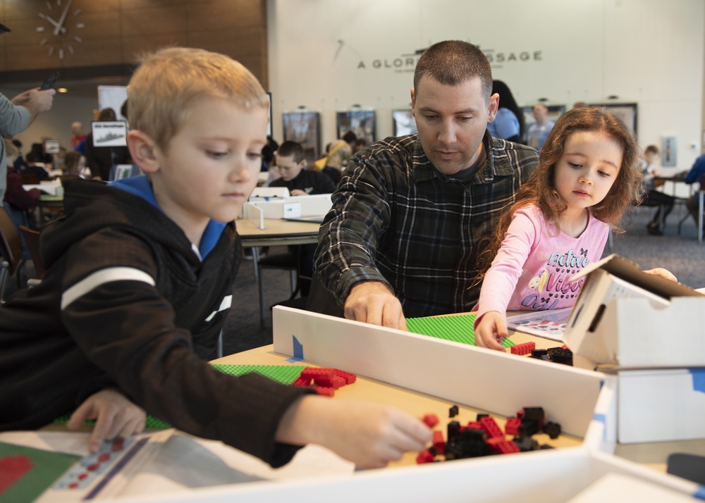 U.S. Navy Sailors volunteer for LEGO Brick by Brick Shipbuilding Event