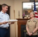 NC1 Melanie Mancuso reenlists at her family home