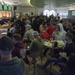 Service members from the U.S. and allied countries cheer on their respective teams while watching the 2020 Super Bowl, Feb. 2, 2020 at Incirlik Air Base, Turkey.