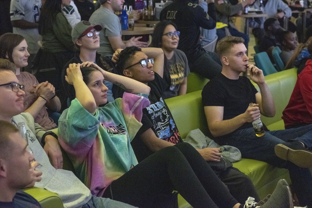 Service members from the U.S. and allied countries cheer on their respective teams while watching the 2020 Super Bowl, Feb. 2, 2020 at Incirlik Air Base, Turkey.