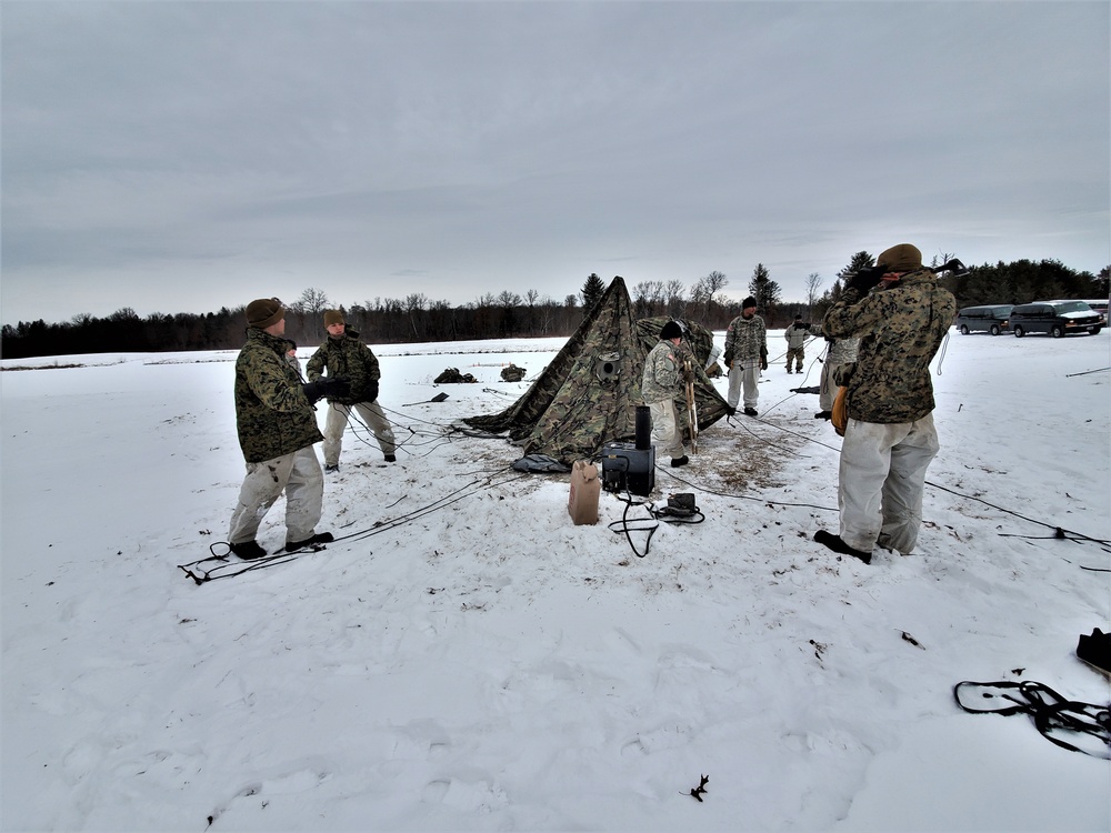 Cold-Weather Operations Course students practice use of Arctic 10-person tent at Fort McCoy