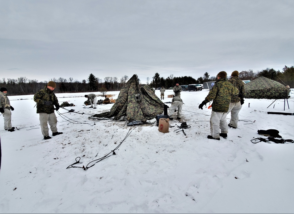 Cold-Weather Operations Course students practice use of Arctic 10-person tent at Fort McCoy