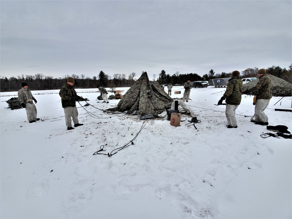 Cold-Weather Operations Course students practice use of Arctic 10-person tent at Fort McCoy