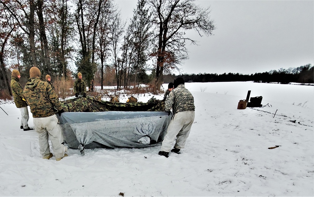 Cold-Weather Operations Course students practice use of Arctic 10-person tent at Fort McCoy