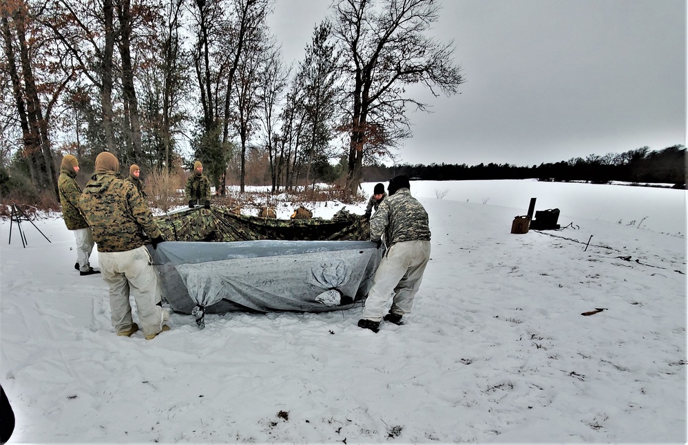 Cold-Weather Operations Course students practice use of Arctic 10-person tent at Fort McCoy