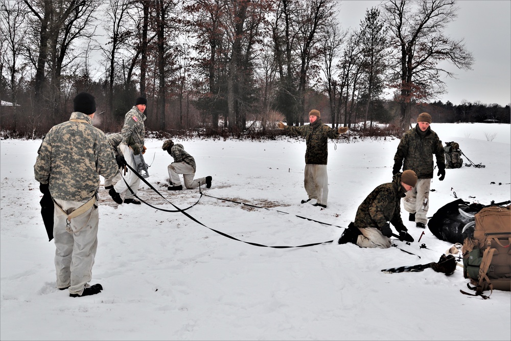 Cold-Weather Operations Course students practice use of Arctic 10-person tent at Fort McCoy