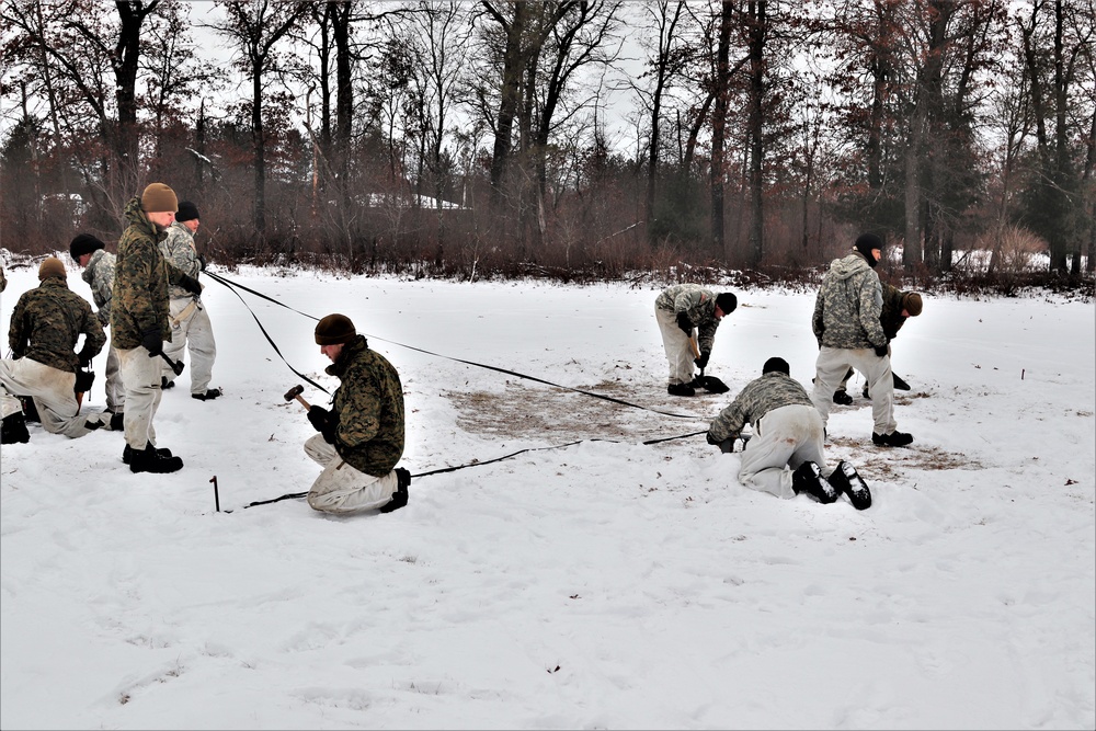 Cold-Weather Operations Course students practice use of Arctic 10-person tent at Fort McCoy