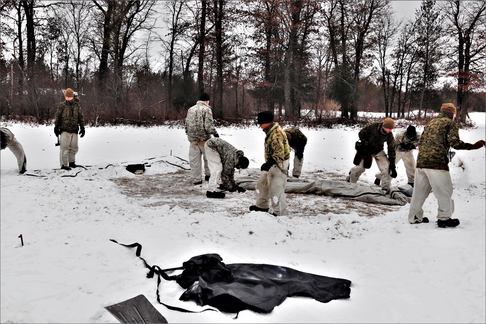 Cold-Weather Operations Course students practice use of Arctic 10-person tent at Fort McCoy