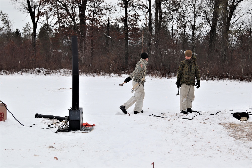 Cold-Weather Operations Course students practice use of Arctic 10-person tent at Fort McCoy