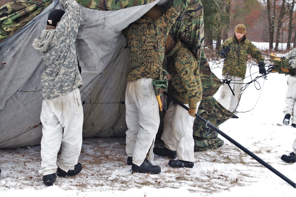 Cold-Weather Operations Course students practice use of Arctic 10-person tent at Fort McCoy