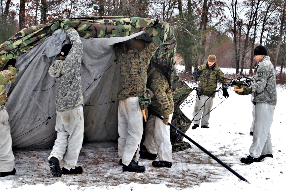 Cold-Weather Operations Course students practice use of Arctic 10-person tent at Fort McCoy