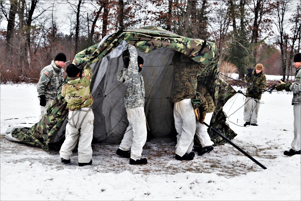 Cold-Weather Operations Course students practice use of Arctic 10-person tent at Fort McCoy