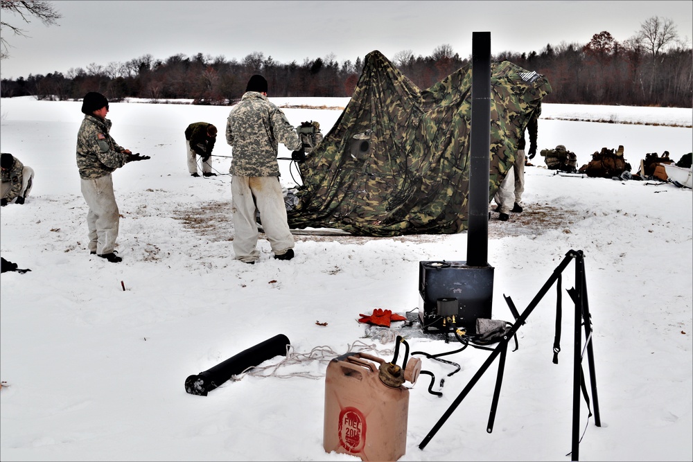 Cold-Weather Operations Course students practice use of Arctic 10-person tent at Fort McCoy