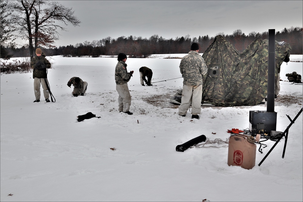 Cold-Weather Operations Course students practice use of Arctic 10-person tent at Fort McCoy