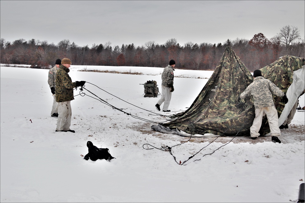 Cold-Weather Operations Course students practice use of Arctic 10-person tent at Fort McCoy