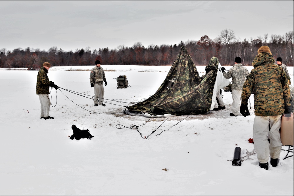 Cold-Weather Operations Course students practice use of Arctic 10-person tent at Fort McCoy