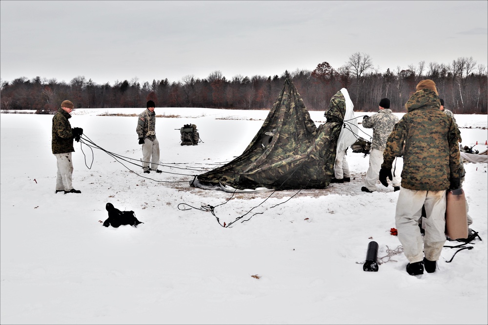 Cold-Weather Operations Course students practice use of Arctic 10-person tent at Fort McCoy