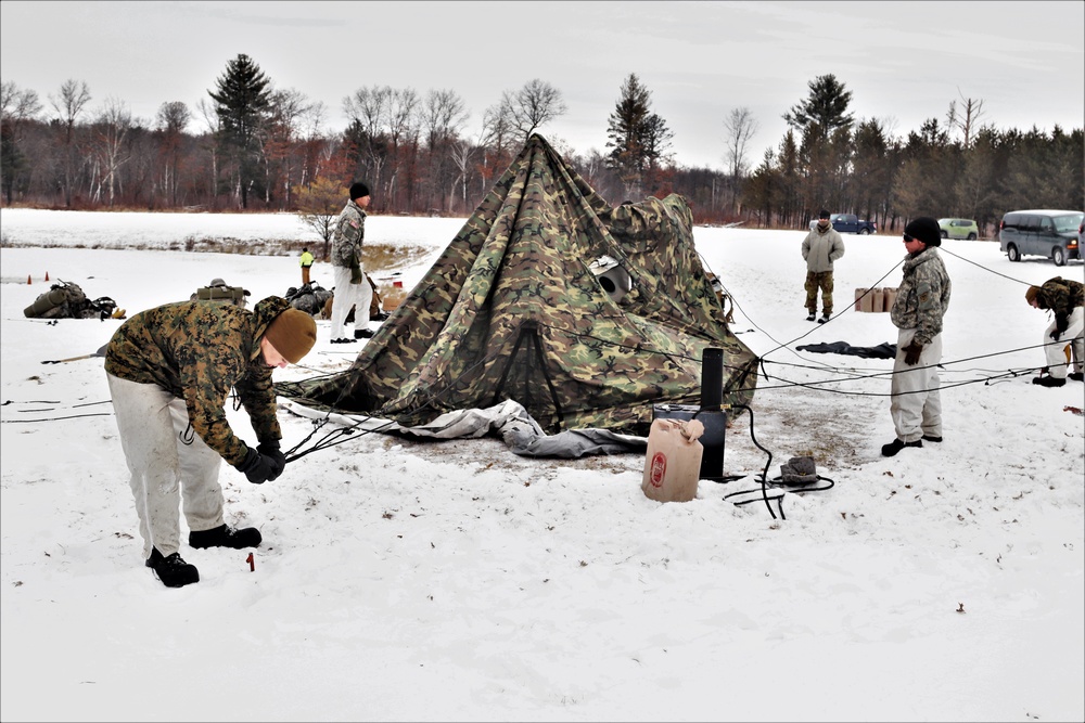 Cold-Weather Operations Course students practice use of Arctic 10-person tent at Fort McCoy