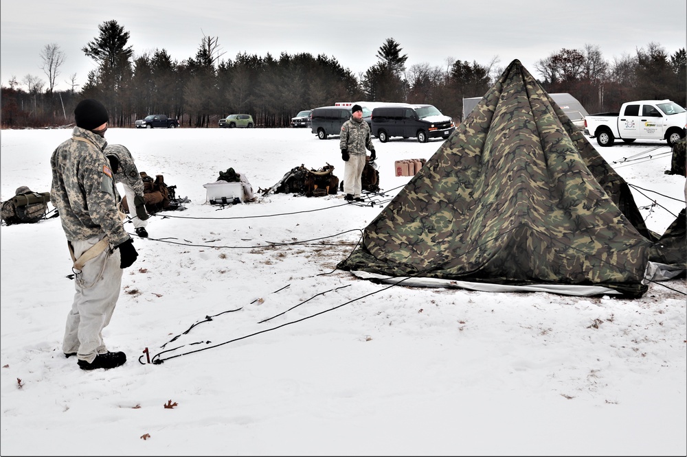 Cold-Weather Operations Course students practice use of Arctic 10-person tent at Fort McCoy