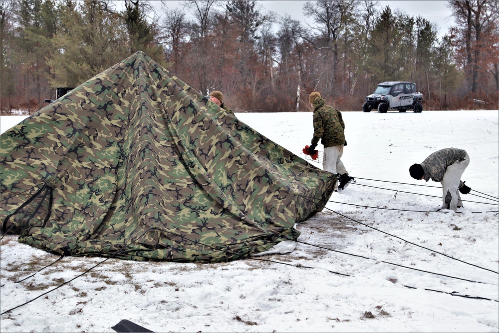 Cold-Weather Operations Course students practice use of Arctic 10-person tent at Fort McCoy