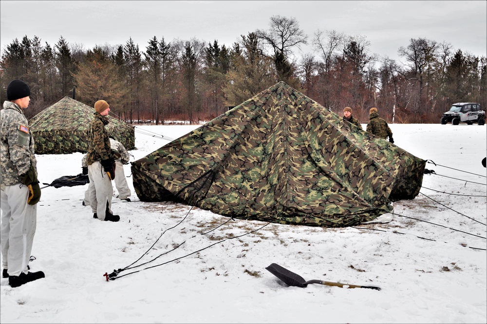 Cold-Weather Operations Course students practice use of Arctic 10-person tent at Fort McCoy