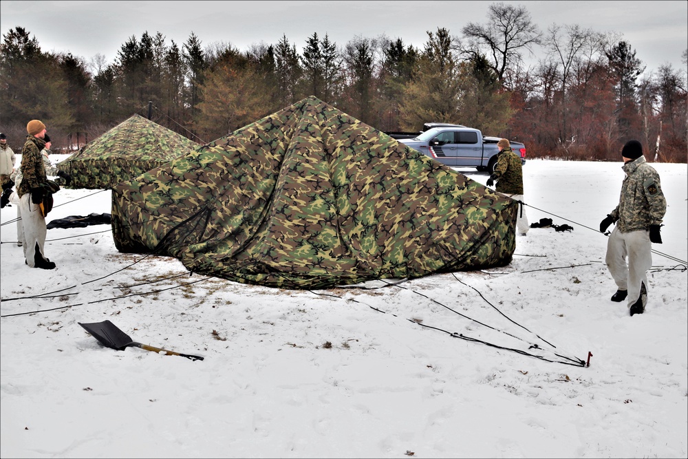 Cold-Weather Operations Course students practice use of Arctic 10-person tent at Fort McCoy