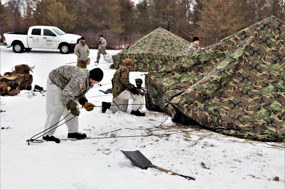 Cold-Weather Operations Course students practice use of Arctic 10-person tent at Fort McCoy