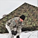 Cold-Weather Operations Course students practice use of Arctic 10-person tent at Fort McCoy