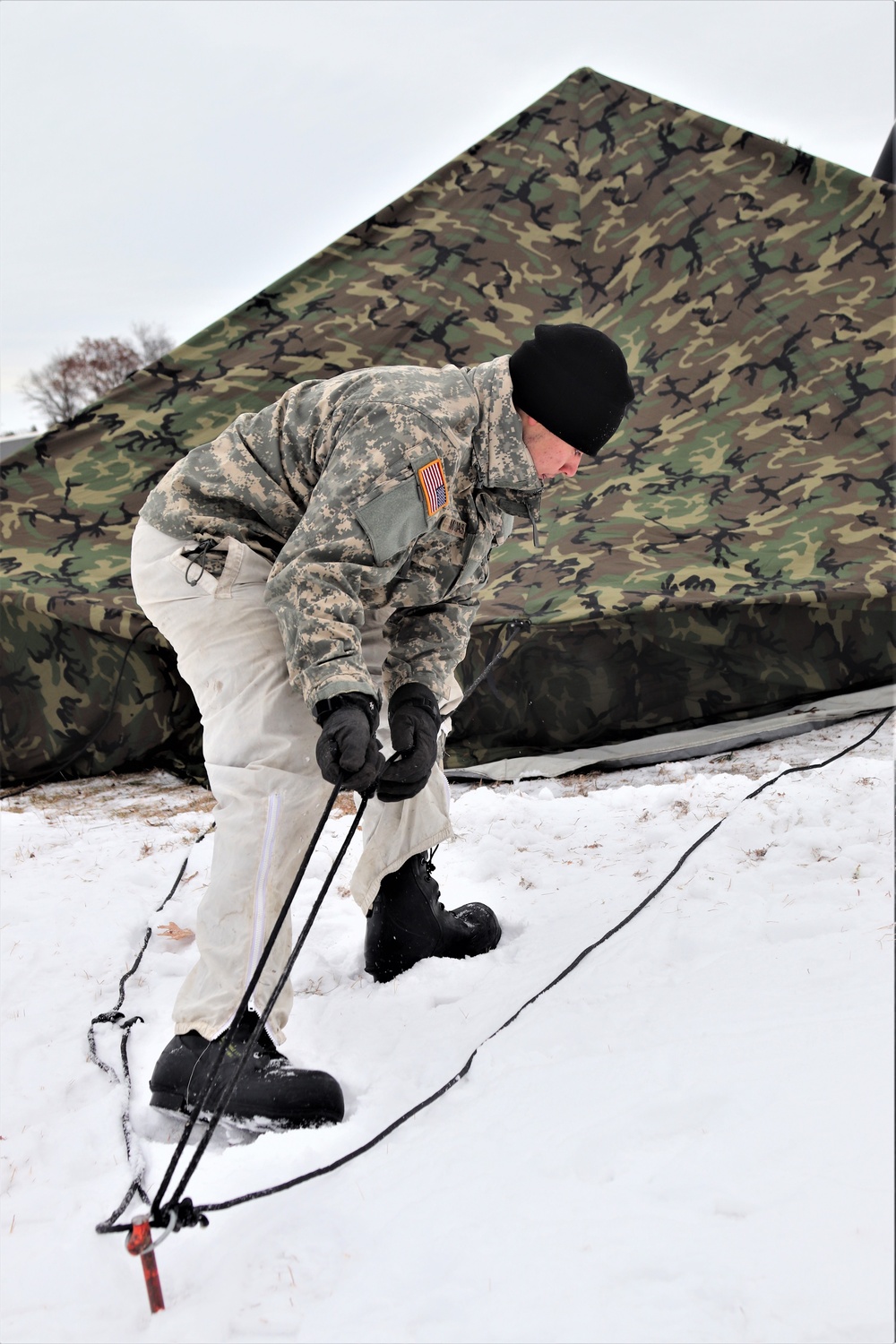 Cold-Weather Operations Course students practice use of Arctic 10-person tent at Fort McCoy