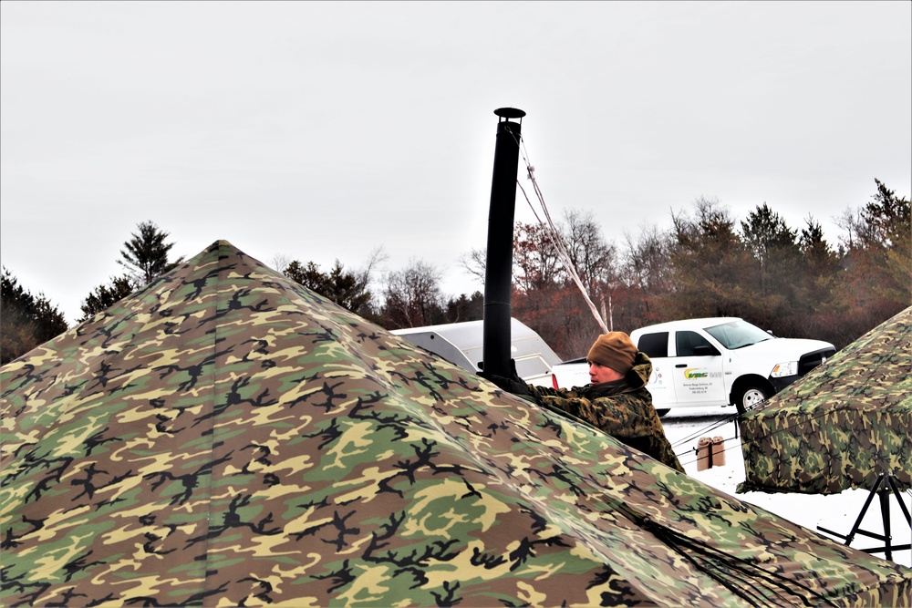 Cold-Weather Operations Course students practice use of Arctic 10-person tent at Fort McCoy