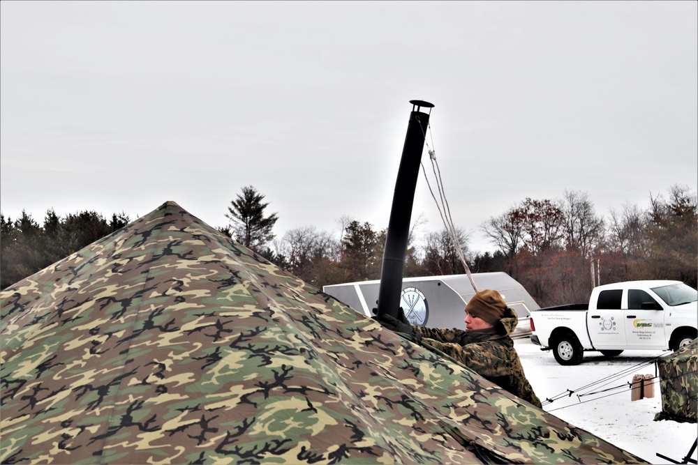 Cold-Weather Operations Course students practice use of Arctic 10-person tent at Fort McCoy