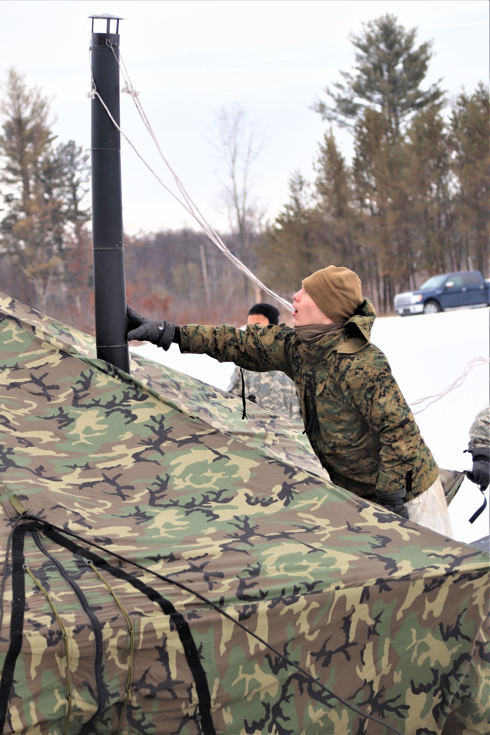 Cold-Weather Operations Course students practice use of Arctic 10-person tent at Fort McCoy