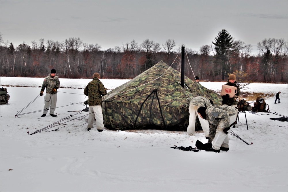 Cold-Weather Operations Course students practice use of Arctic 10-person tent at Fort McCoy