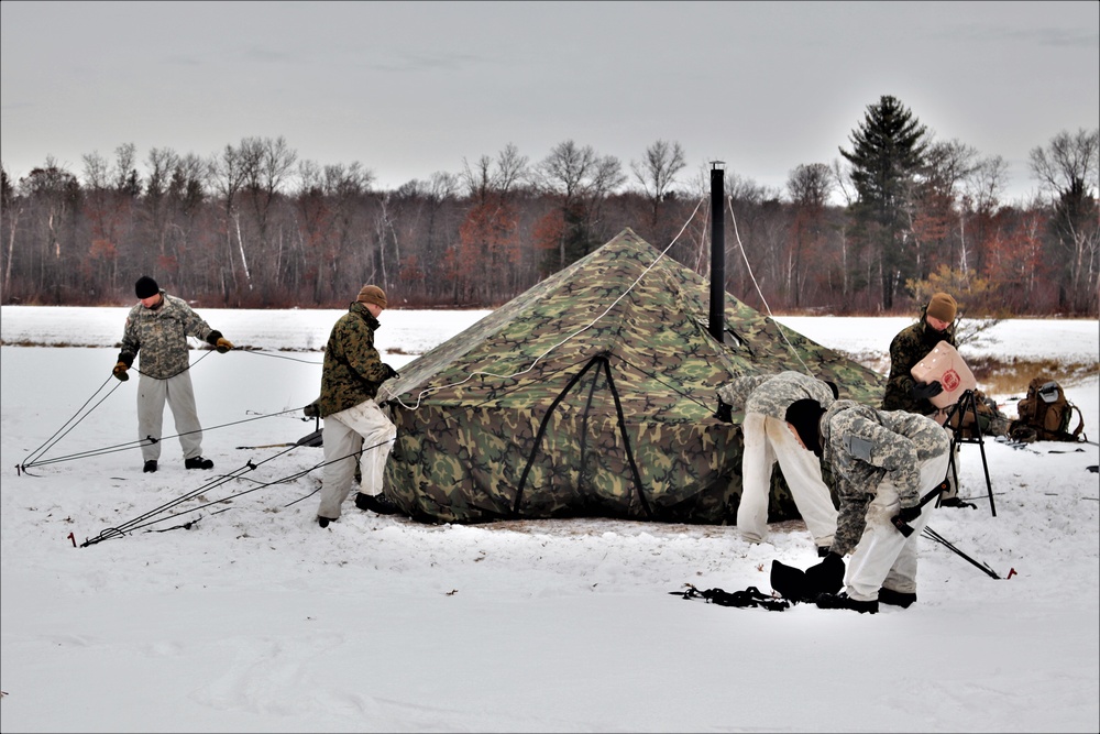 Cold-Weather Operations Course students practice use of Arctic 10-person tent at Fort McCoy