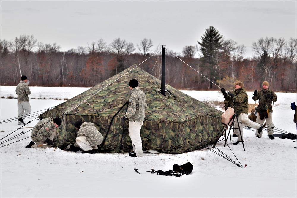 Cold-Weather Operations Course students practice use of Arctic 10-person tent at Fort McCoy