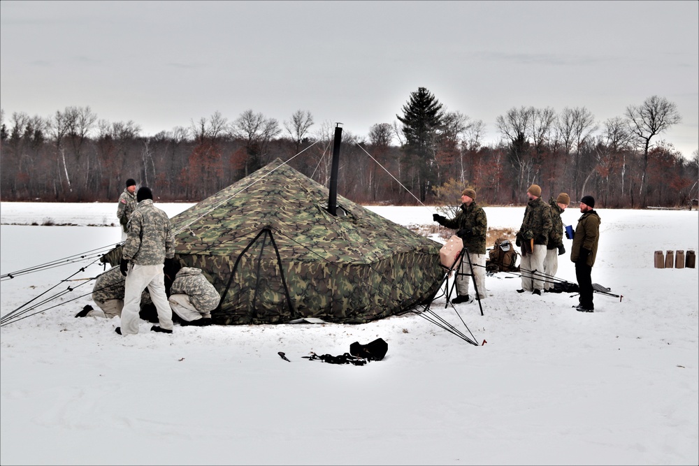 Cold-Weather Operations Course students practice use of Arctic 10-person tent at Fort McCoy