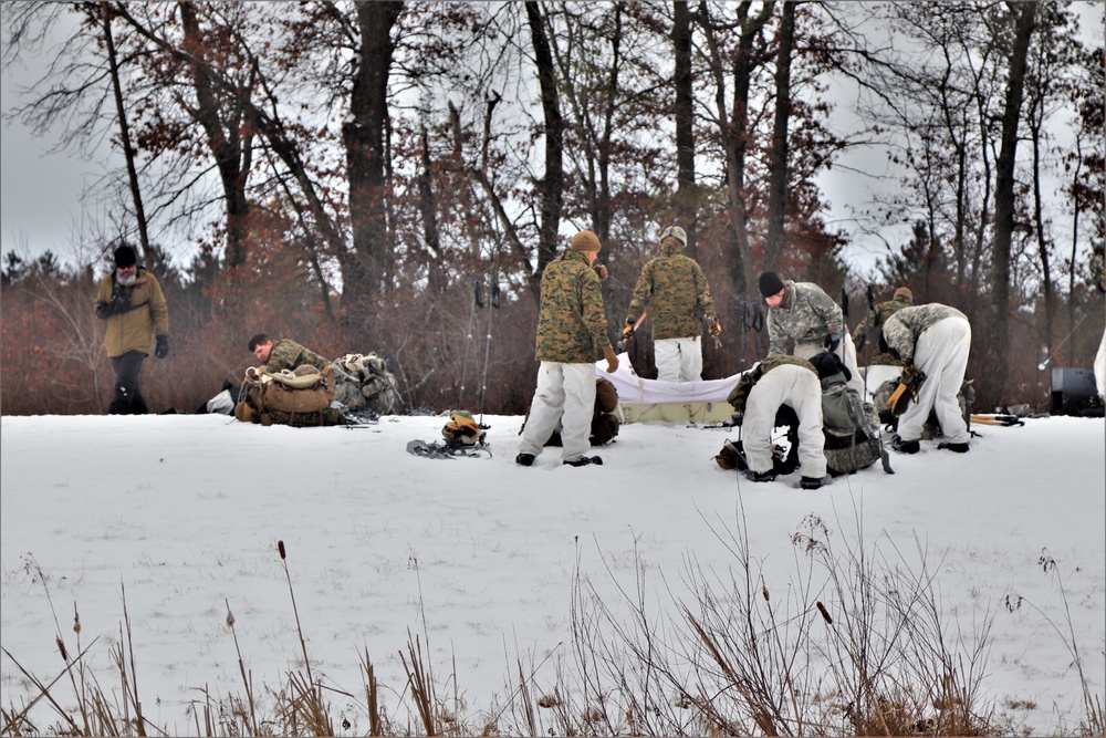 Cold-Weather Operations Course students practice use of Arctic 10-person tent at Fort McCoy