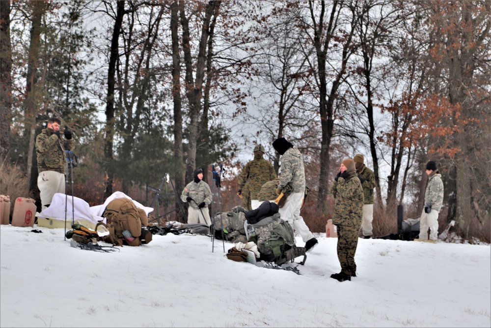 Cold-Weather Operations Course students practice use of Arctic 10-person tent at Fort McCoy