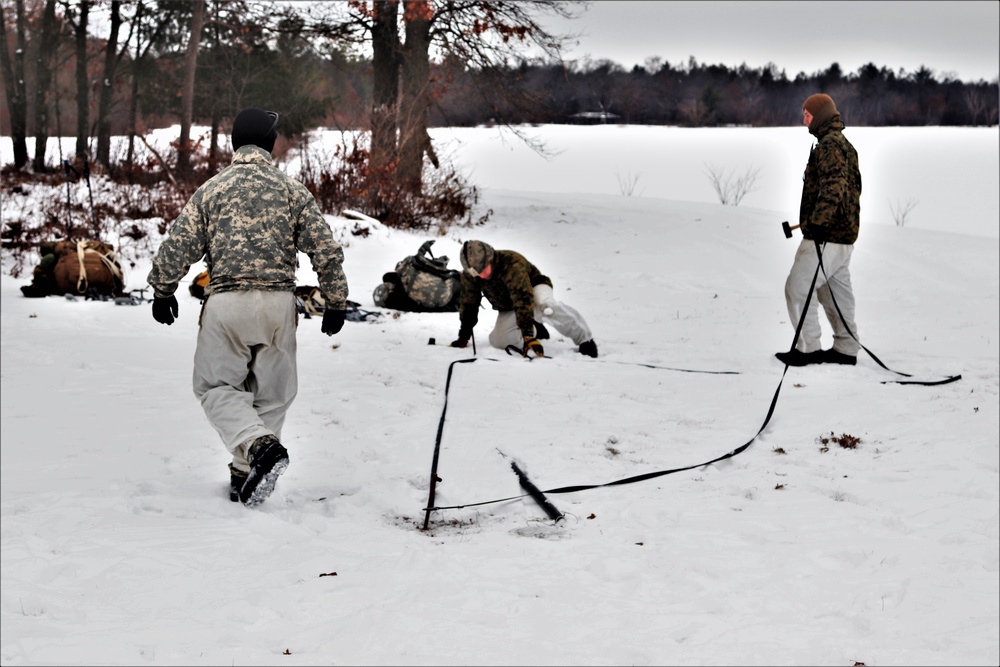 Cold-Weather Operations Course students practice use of Arctic 10-person tent at Fort McCoy