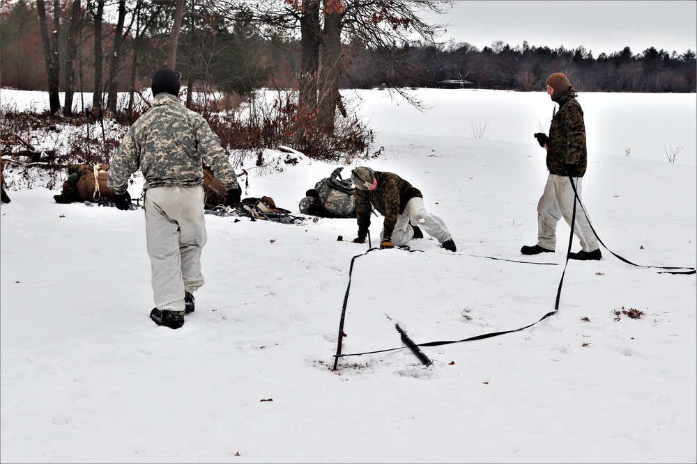 Cold-Weather Operations Course students practice use of Arctic 10-person tent at Fort McCoy