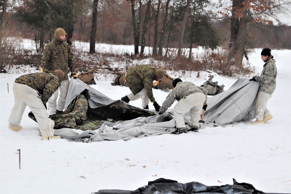 Cold-Weather Operations Course students practice use of Arctic 10-person tent at Fort McCoy